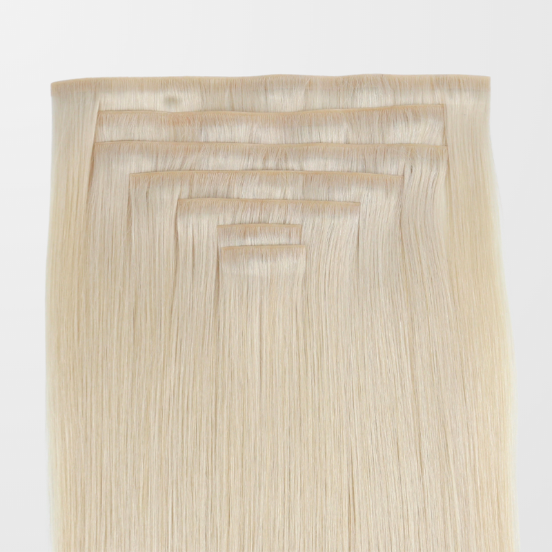 Load image into Gallery viewer, Blonde Invisible clip in hair extensions on a white background