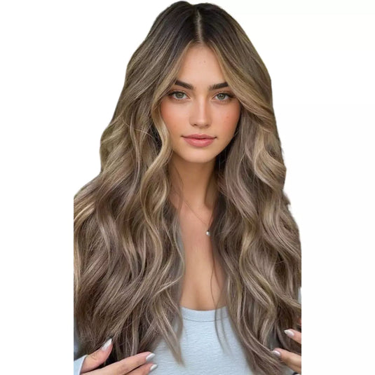 Model wearing long wavy ombre brown human hair butterfly weft extensions
