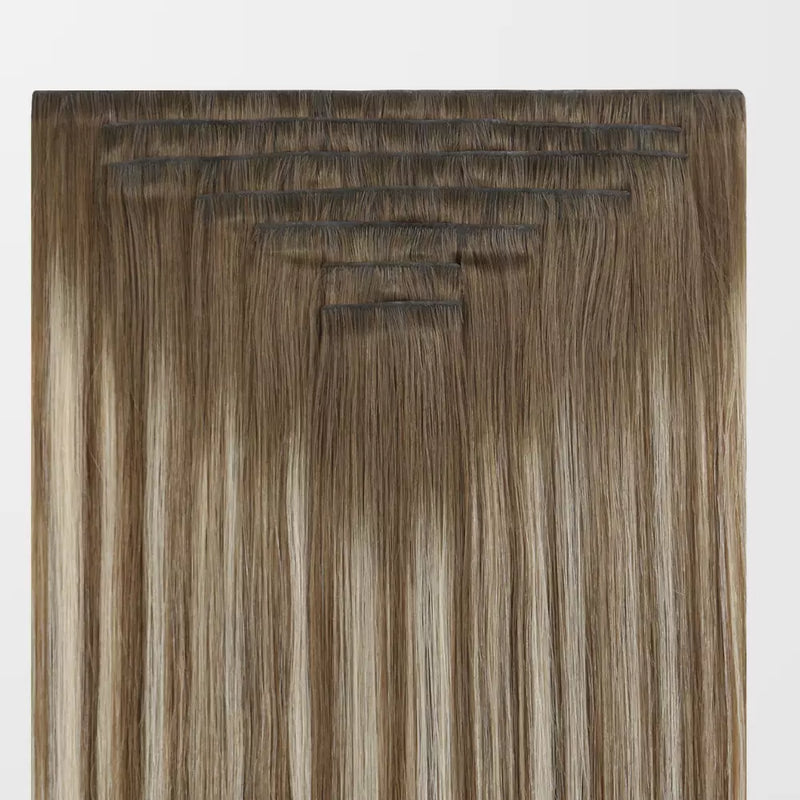 Load image into Gallery viewer, Balayage brown remy clip in hair extensions on a white background