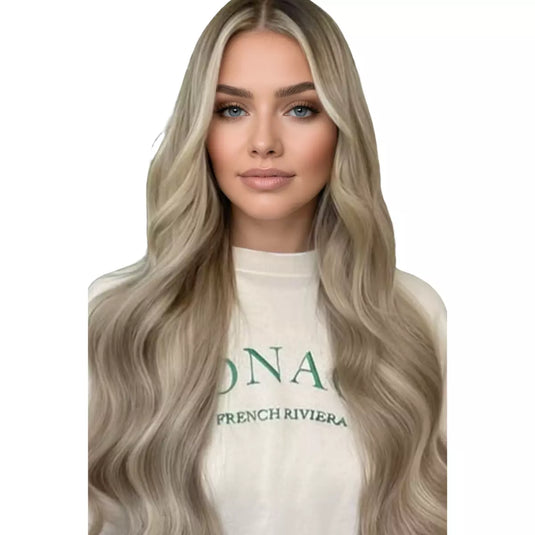 Model wearing long wavy blonde highlights human hair butterfly weft extensions