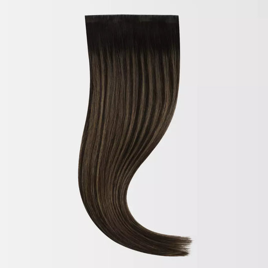 Brown clip hair extension on a white background