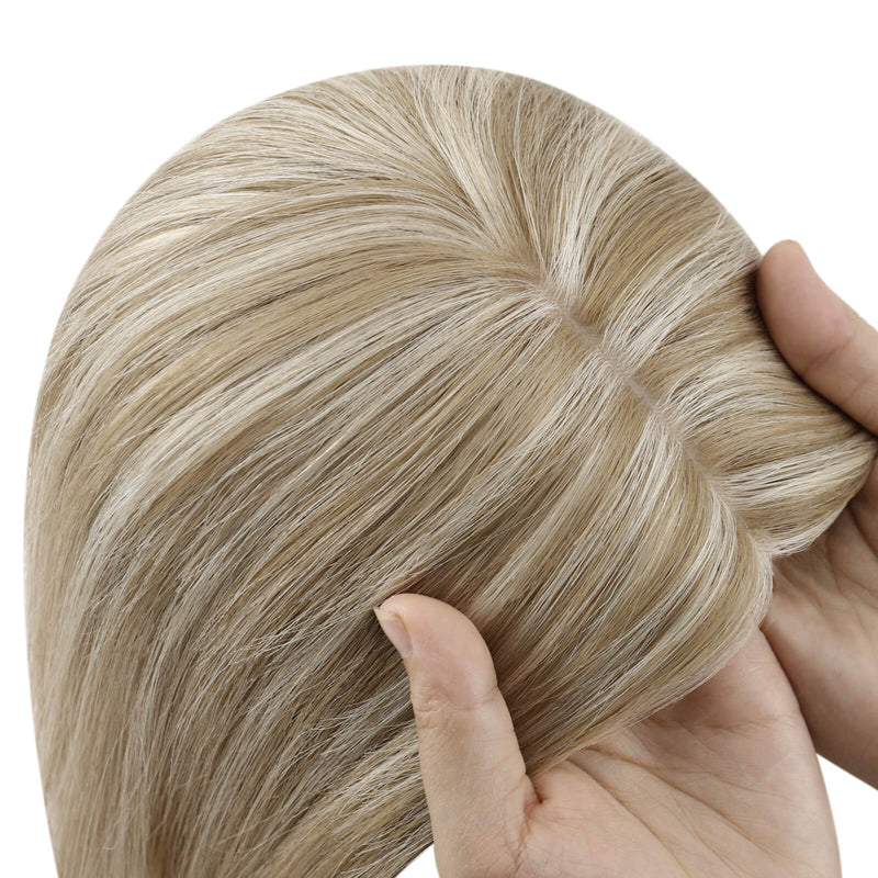 Load image into Gallery viewer, A close-up of a hair topper section with straight, smooth strands in a light ash blonde color, on a plain white background.
