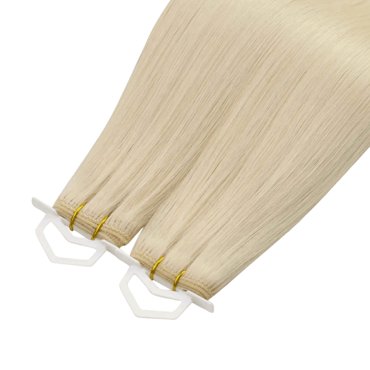 Blonde Remy virgin human hair machine weft, soft and natural extensions for sew-in hairstyles.
