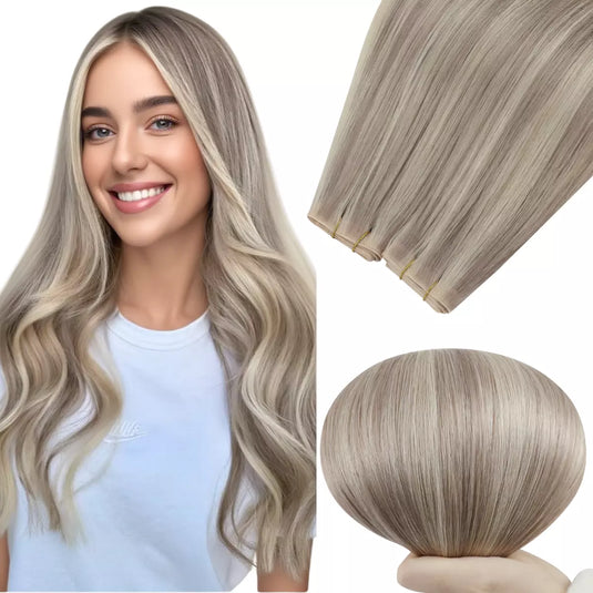 Woman with long wavy hair next to hair extensions on a white background