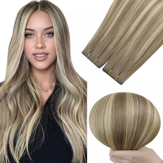 Model wearing long wavy ombre blonde human hair butterfly weft extensions