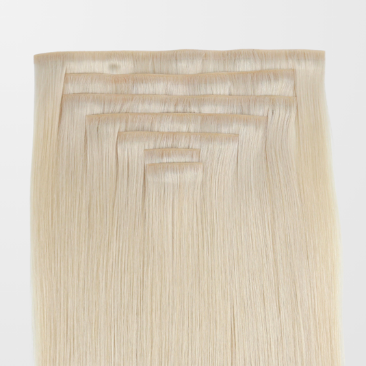 Blonde Invisible clip in hair extensions on a white background