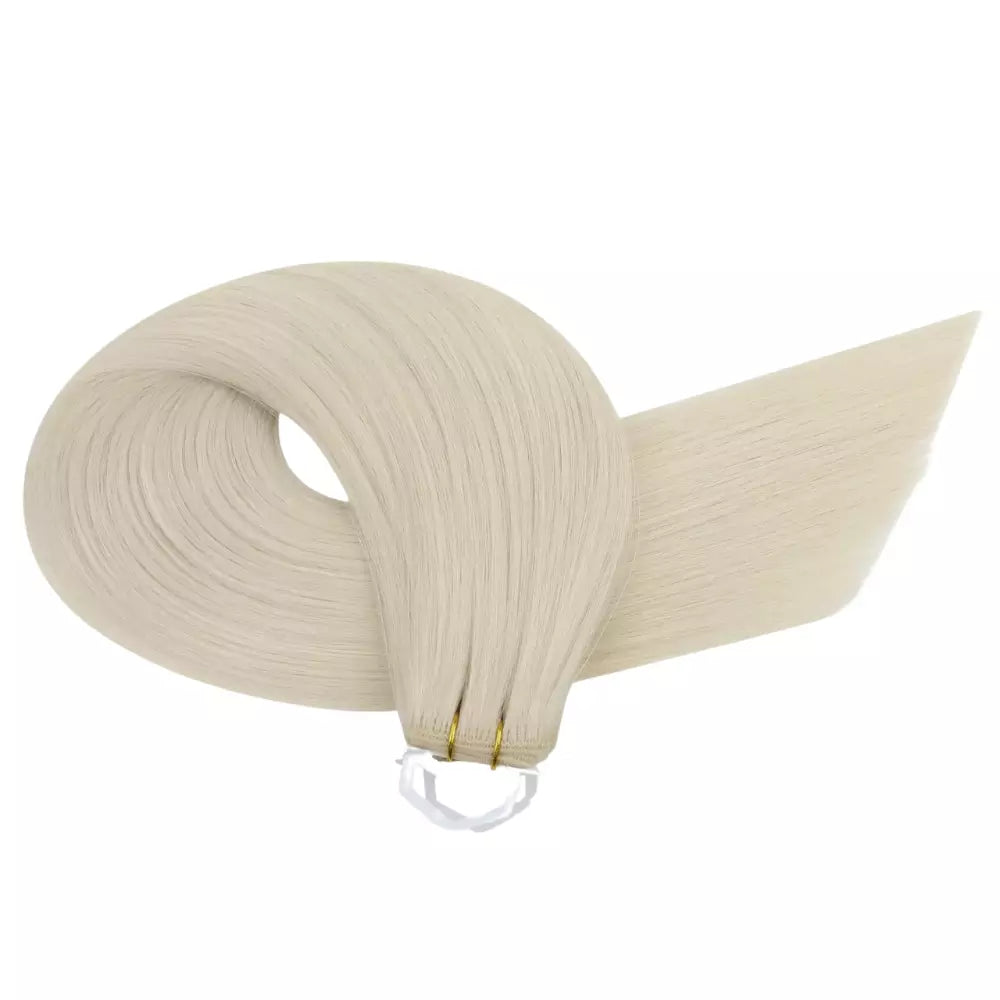 100% virgin Remy human hair machine weft extensions, soft and silky blonde hair for sew-in styles.