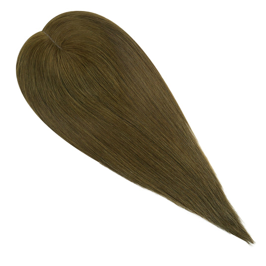 Brown hair topper on a white background