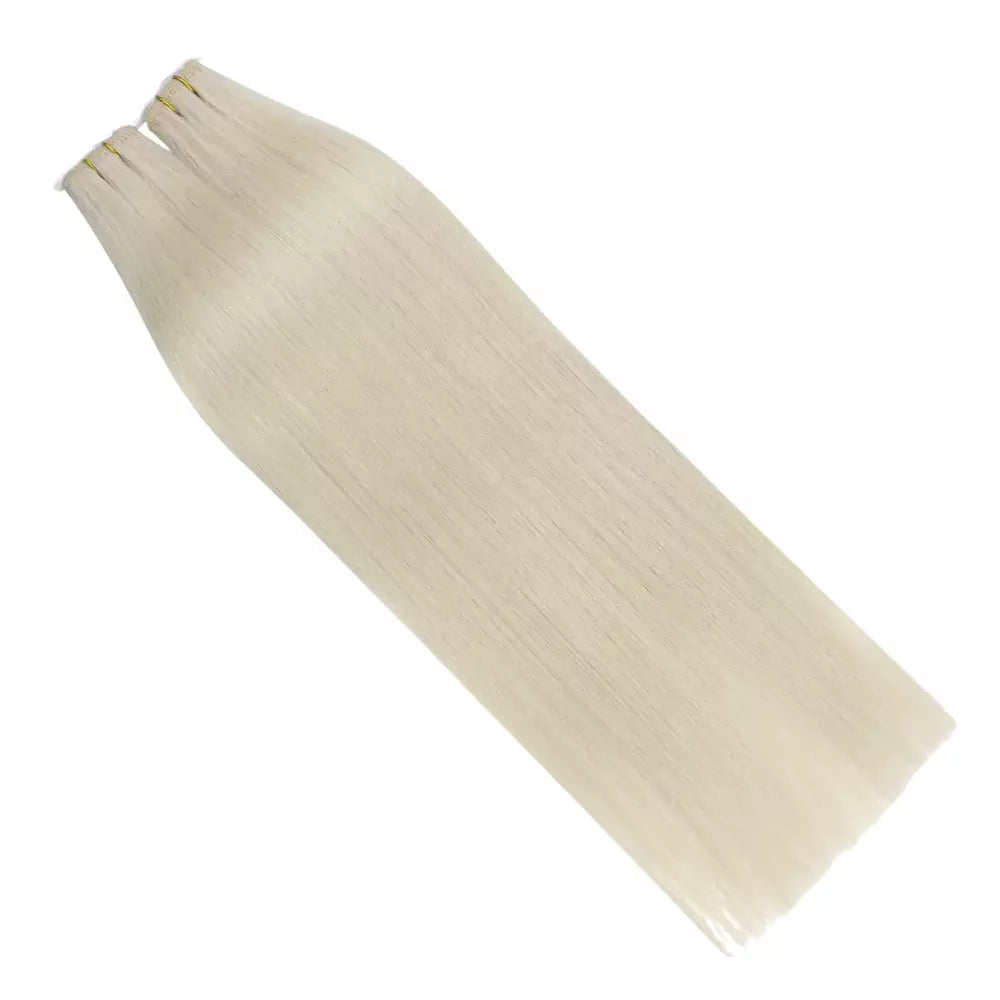 Premium virgin Remy human hair machine weft, durable and tangle-free blonde hair extensions.