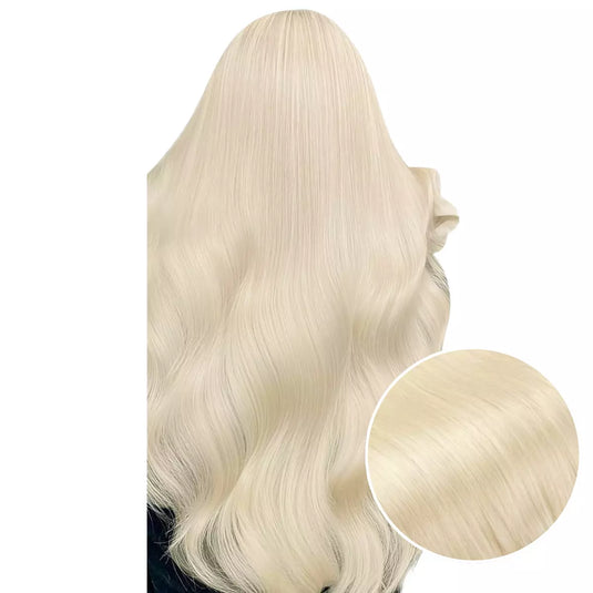 Woman with long double weft, with a close-up inset of hair color.