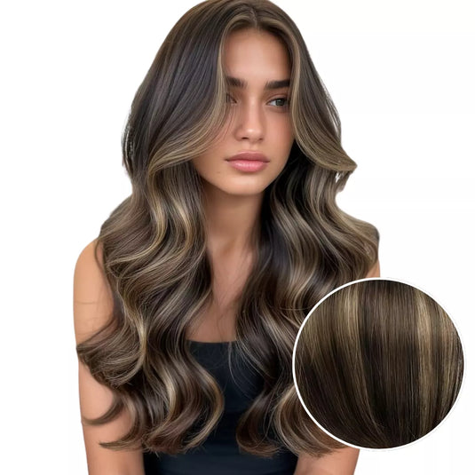 Woman with long double weft, with a close-up inset of hair color.