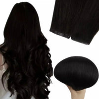 Black butterfly weft hair extensions on a white background