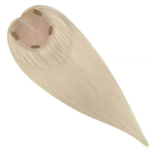 Blonde hair topper on a white background