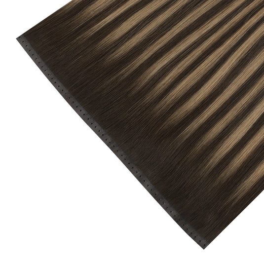 Balayage brown butterfly weft hair extension on a white background