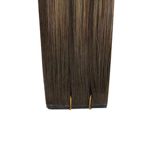 Brown butterfly weft hair extension on a white background