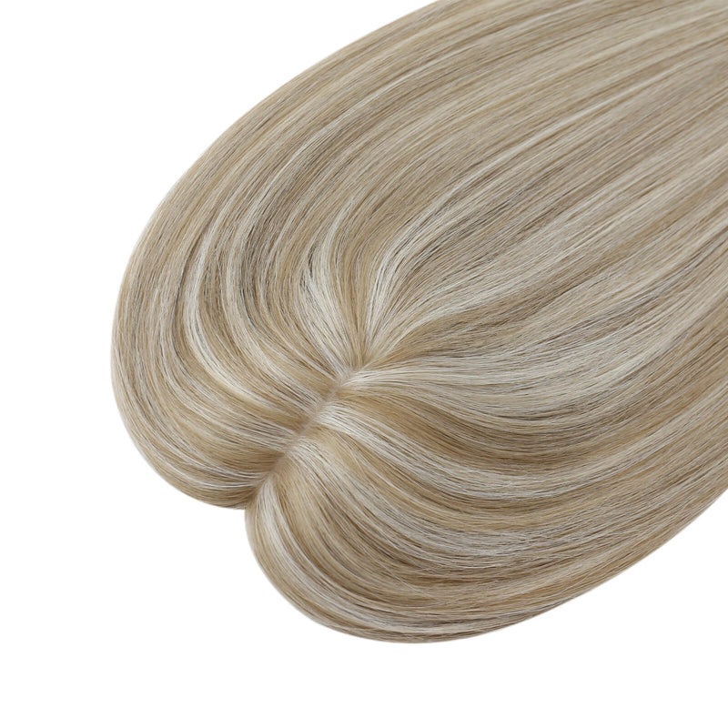 Load image into Gallery viewer, A close-up of a hair topper section with straight, smooth strands in a light ash blonde color, on a plain white background.
