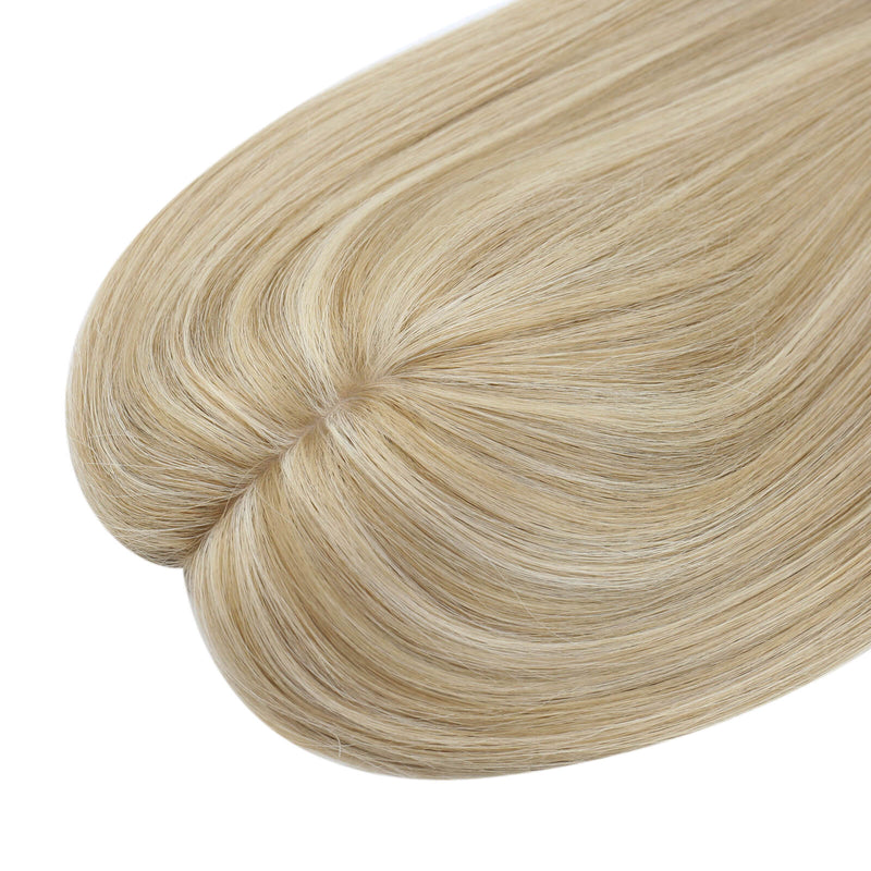 Load image into Gallery viewer, A close-up of a hair topper section with straight, smooth strands in a light ash blonde color, on a plain white background.
