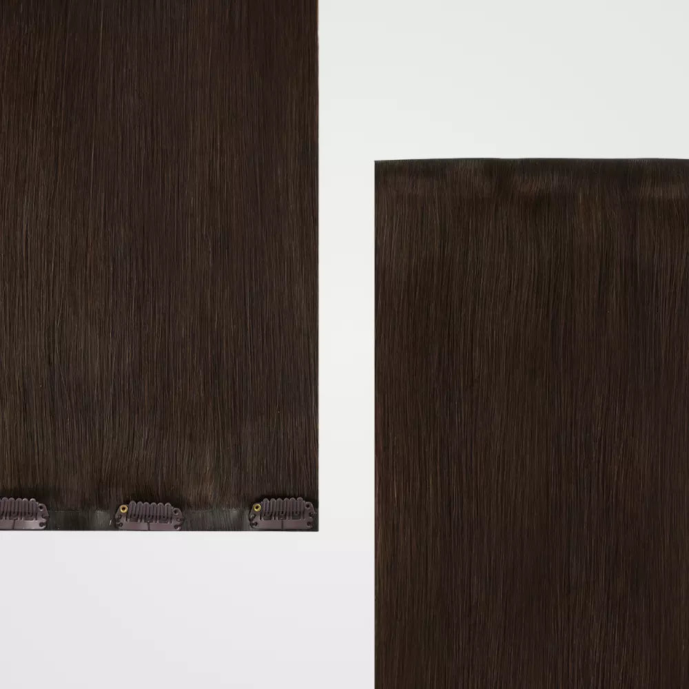 Dark brown hair extensions on a white background