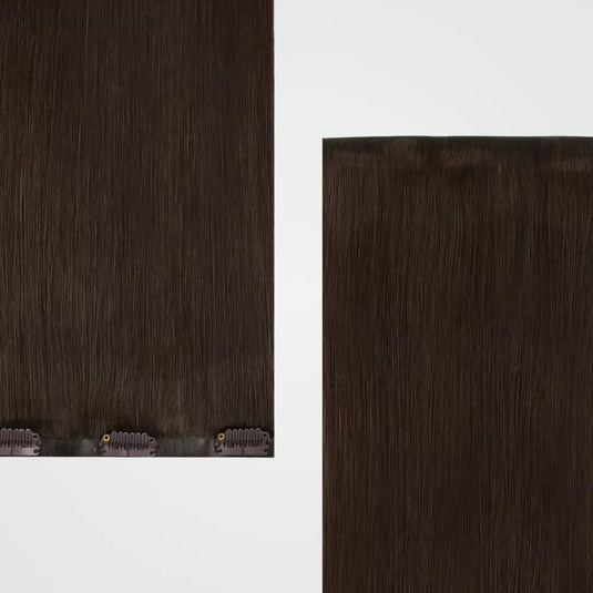 Dark brown hair extensions on a white background