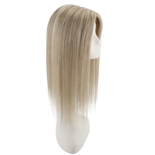 A straight, shoulder-length topper with a light ash blonde color, displayed on a white mannequin head against a plain white background.