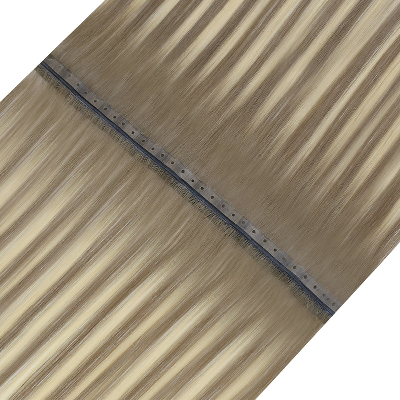 Load image into Gallery viewer, Close-up of blonde invisible flat weft hair extensions
