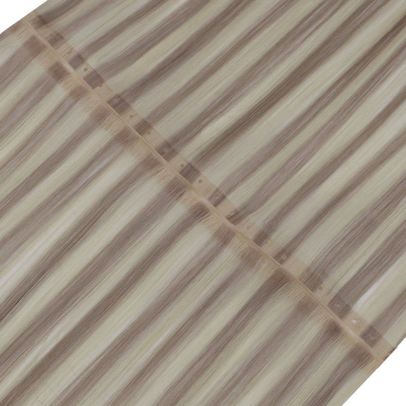 Load image into Gallery viewer, Close-up of invisible flat weft hair extensions
