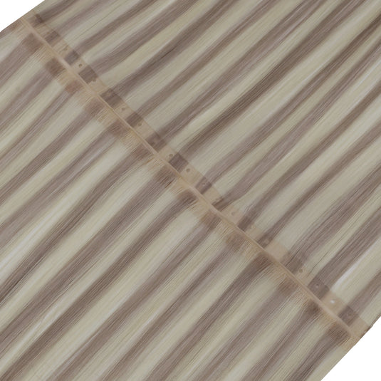 Close-up of invisible flat weft hair extensions