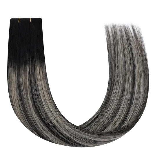 Gray hair extension with gradient color on a white background