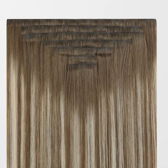 Balayage brown remy clip in hair extensions on a white background