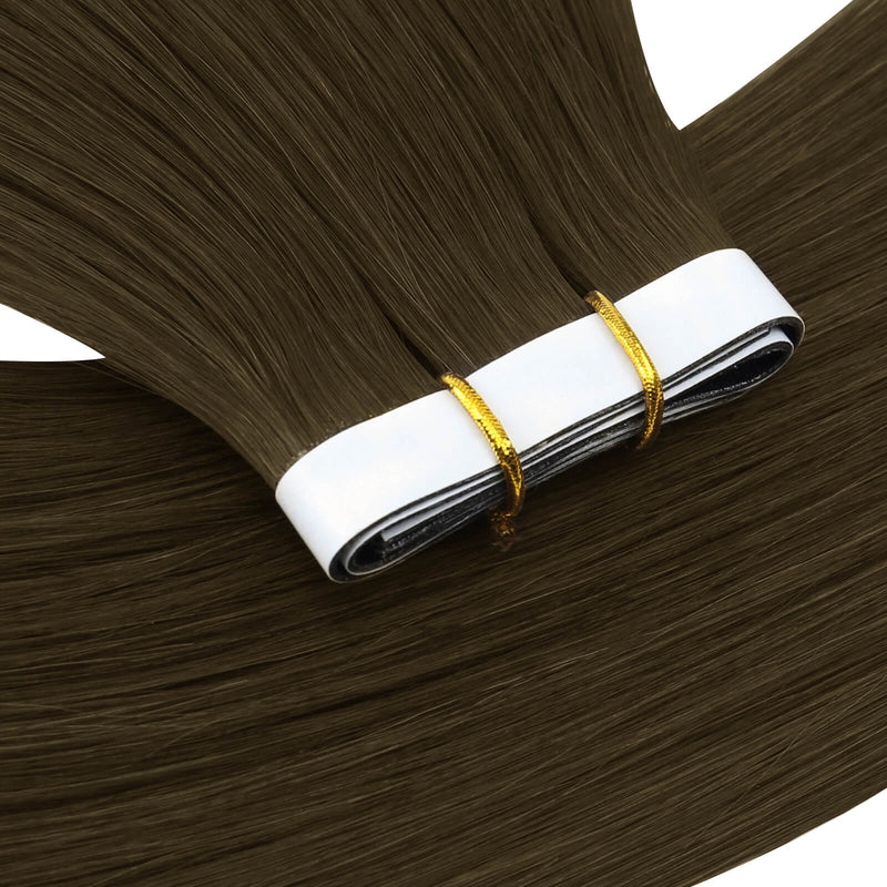 Load image into Gallery viewer, Dark brown hair extension bundles with white elastic bands and gold ties, shown against a white background.
