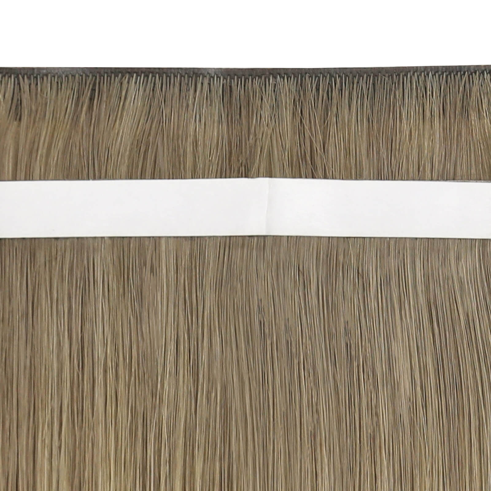 Close-up view of blonde highlight tape-in weft hair extensions.