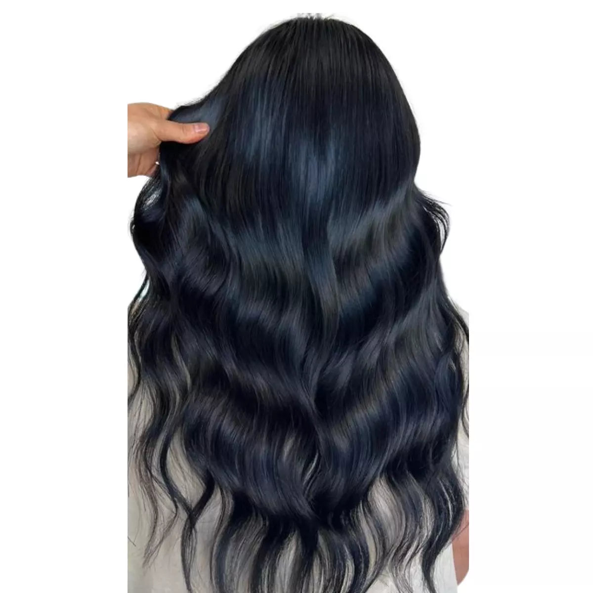 Jet Black invisible tape in weft hair extensions on a white background