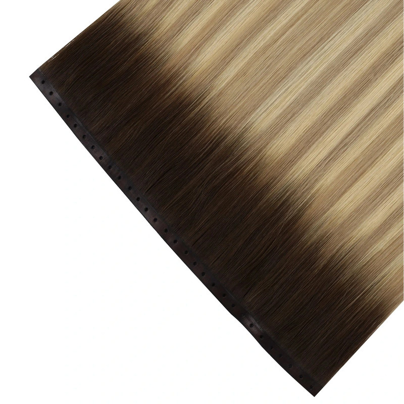 Load image into Gallery viewer, Blonde butterfly weft hair extensions on a white background
