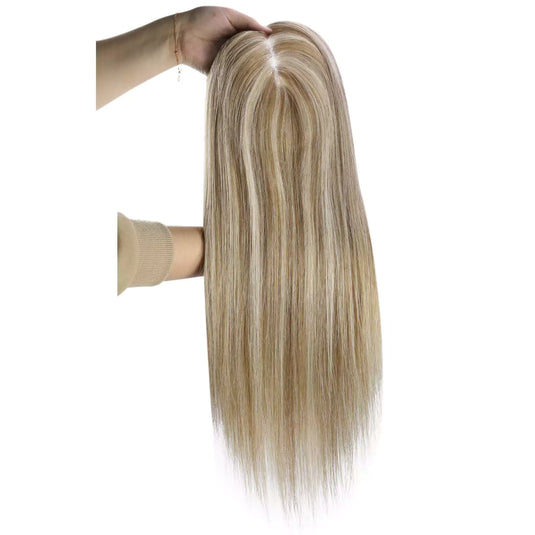 A long, straight topper with a blonde highlight color, displayed on a white mannequin head against a plain white background.