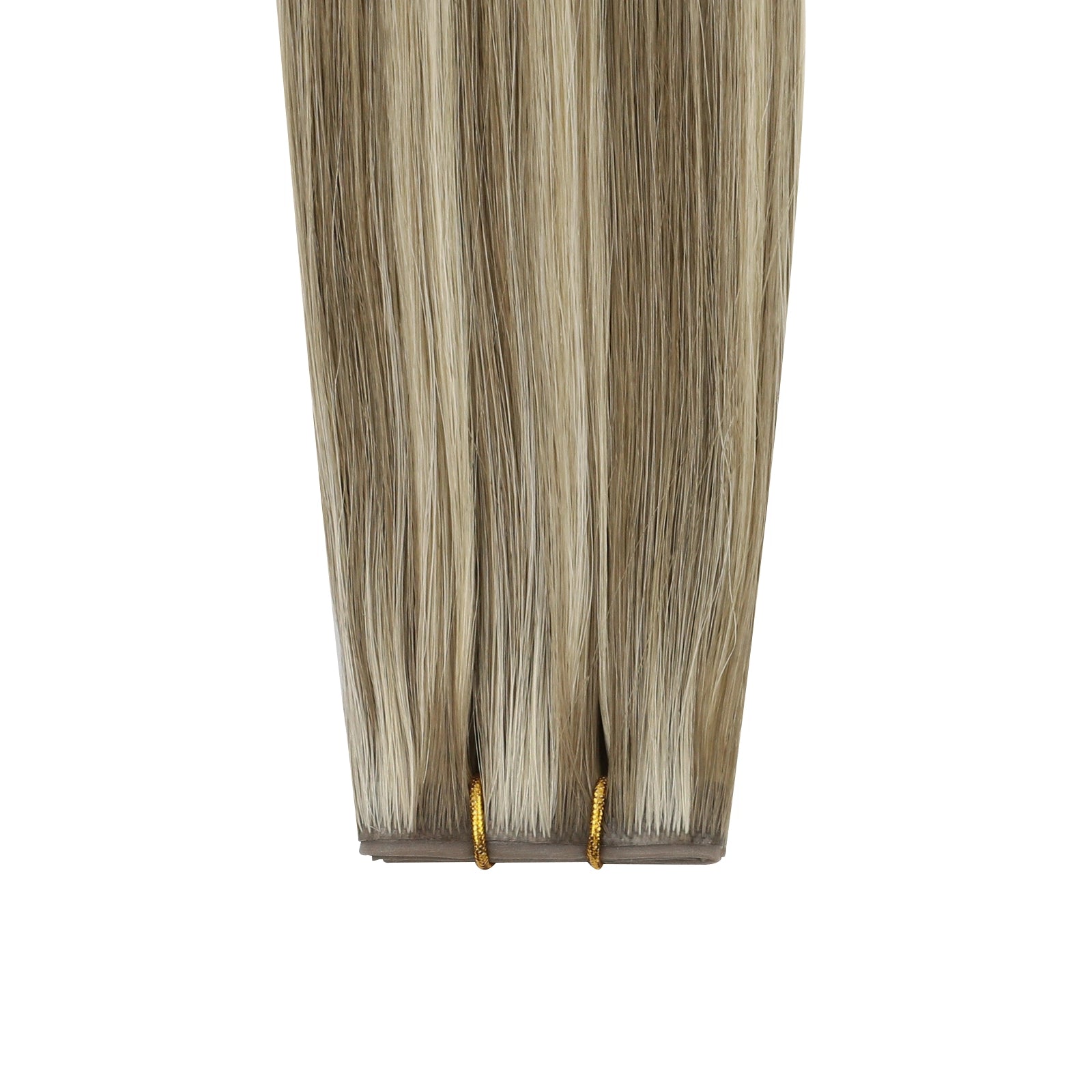 Invisible butterfly weft hair extensions with brown and blonde highlights on a white background