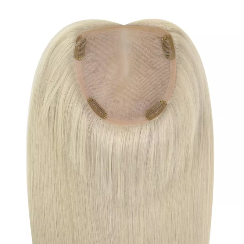 Load image into Gallery viewer, A close-up of a hairpiece extension with straight, shoulder-length blonde hair and a blonde checkered adhesive inner cap on a white background.
