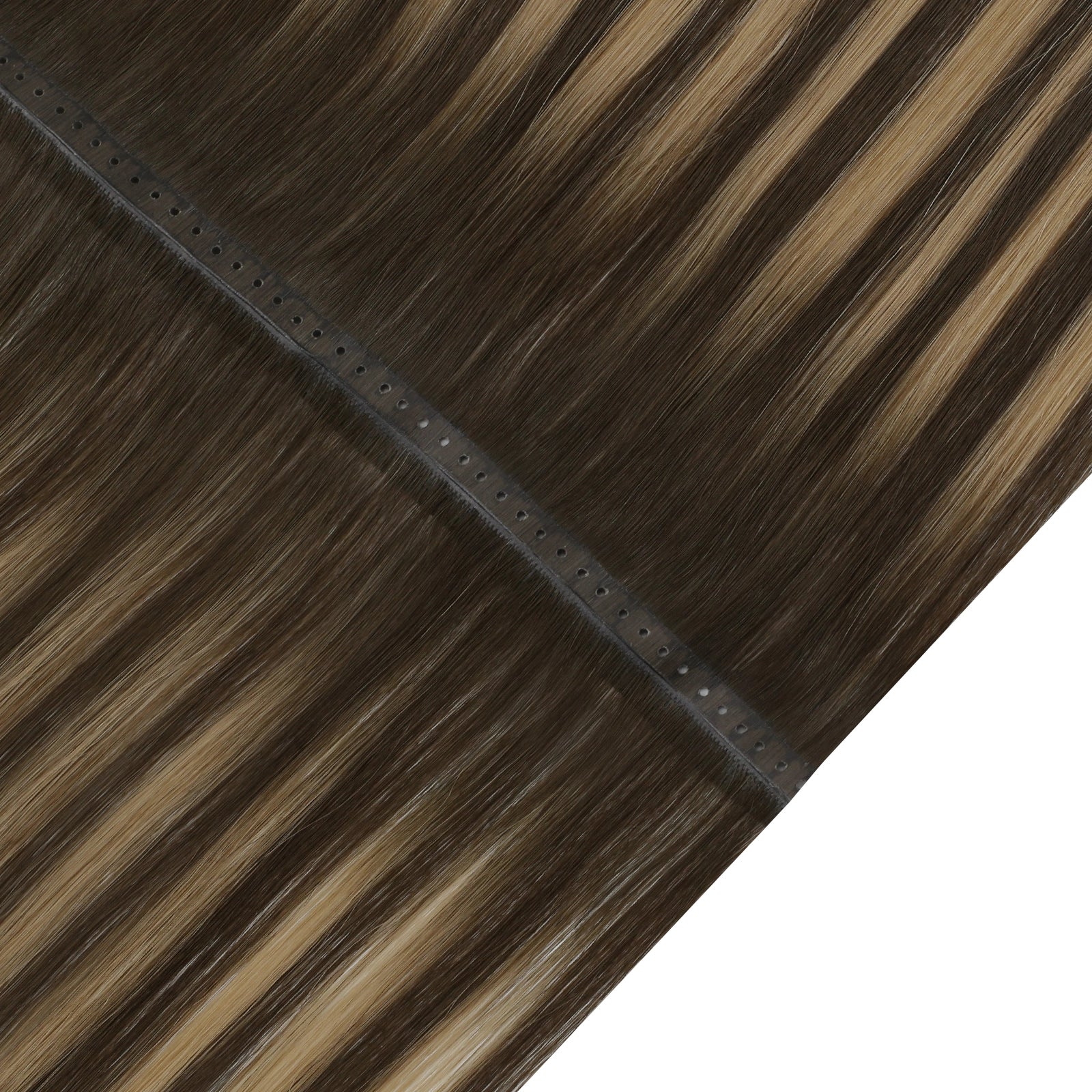 Close-up of brown butterfly hair extensions with a black clip.