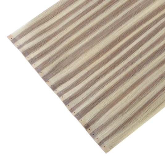 Close-up of invisible flat weft hair extensions