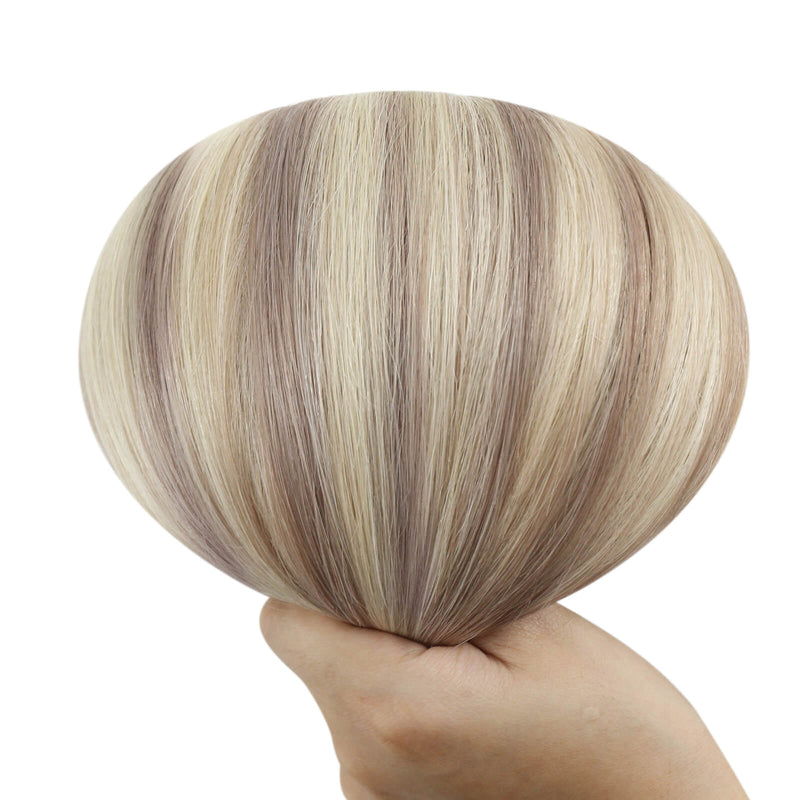 Load image into Gallery viewer, A close-up of a human hair butterfly weft hair extension bundle with long, straight strands in alternating light beige and medium brown tones.
