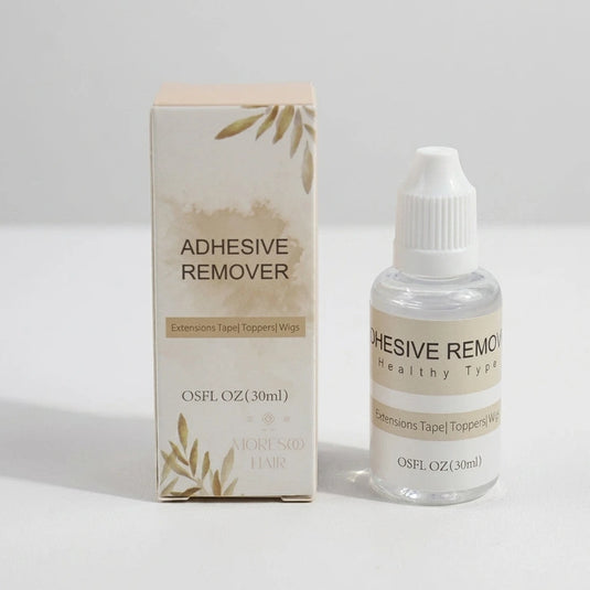 Adhesive remover bottle and packaging on a white background