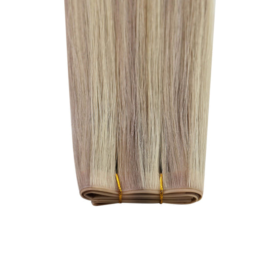 Close-up of invisible flat weft hair extensions