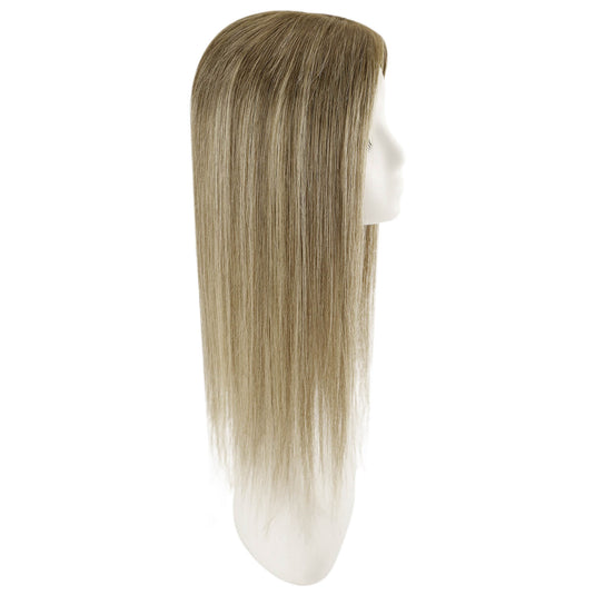 A long, straight topper with a warm brown and blonde ombré color, displayed on a white mannequin head against a plain white background.