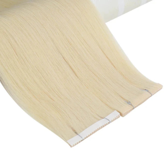 Load image into Gallery viewer, 22-inch platinum blonde hair tape in, invisible platinum blonde tape in extensions, high-quality platinum blonde tape in, luxurious platinum blonde hair extensions, salon-quality platinum blonde tape in extensions, 14-inch platinum blonde extensions, 18-inch platinum blonde tape in

