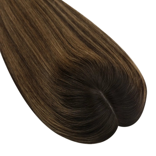 A close-up of a hair topper section with straight, smooth strands in a dark brown color, on a plain white background.