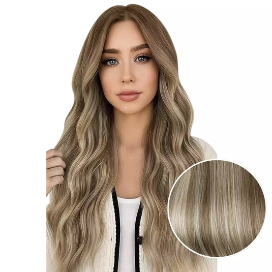 Model with long, light brown tape hair extensions on a white background