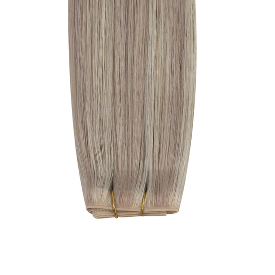 Virgin hair seamless pu skin weft on a white background