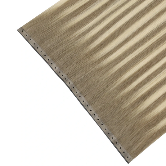 Blonde butterfly weft hair extension on a white background