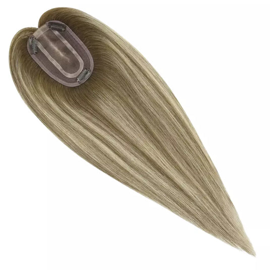 Balayage brown with blonde human hair topper with clip on a white background