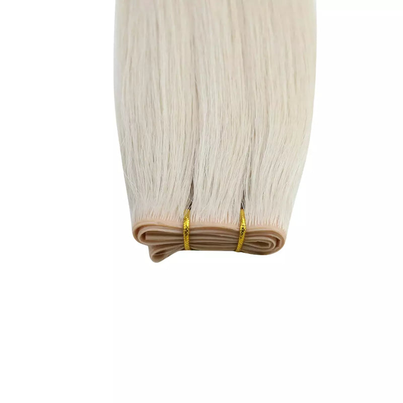 Load image into Gallery viewer, blonde butterfly weft hair extensions on a white background
