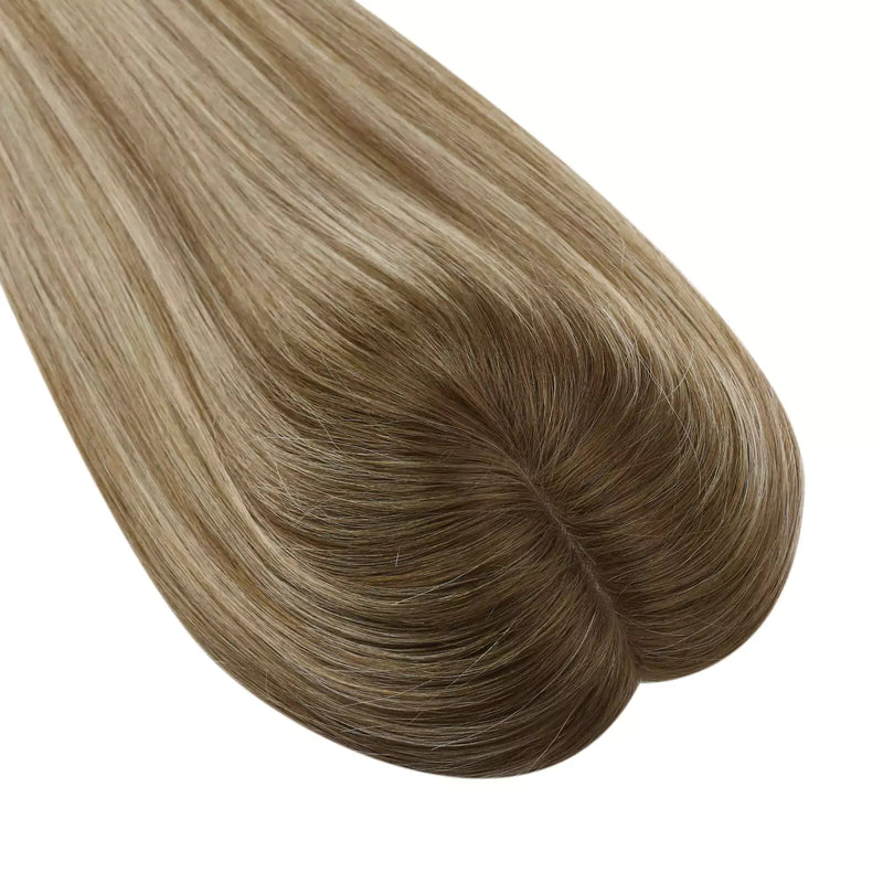 Load image into Gallery viewer, A close-up of a topper section with straight, glossy strands in a blended light brown and blonde balayage pattern, isolated on a white background.
